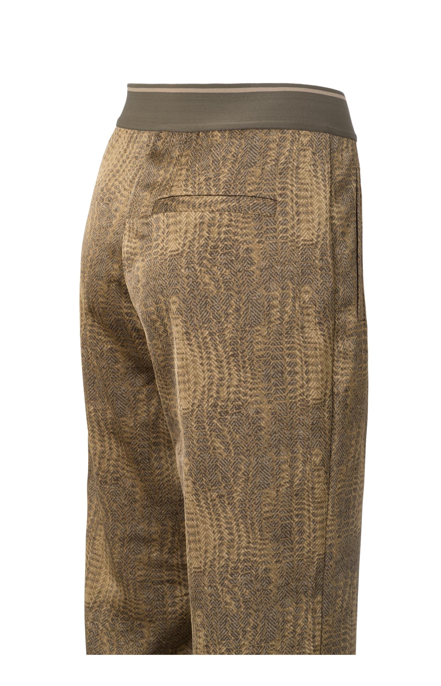 Wide leg trousers with pockets, zip fly and snake print
